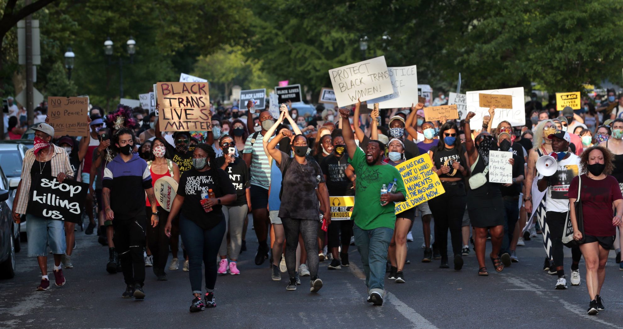 Protesters march to mayor's house